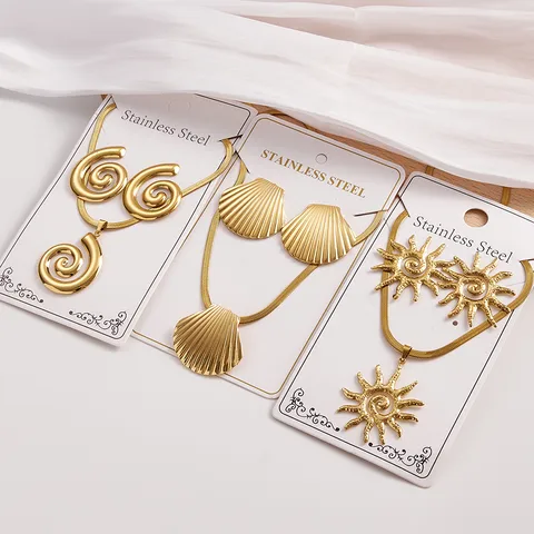 Gold Statement Jewelry Sets – Spiral, Seashell & Sunburst